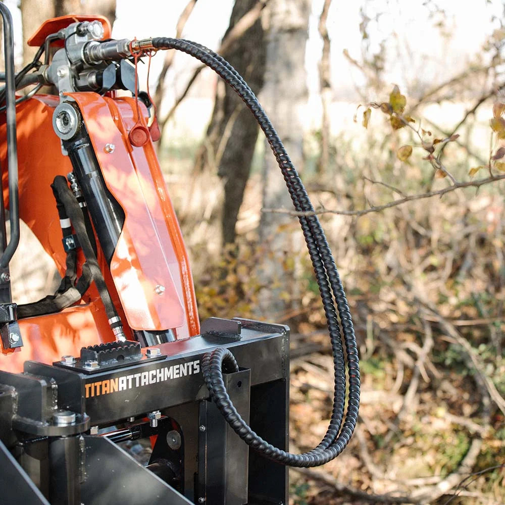 Accessoires Titan : extracteur de poteaux et d'arbres pour chargeuse compacte et tracteur niveleur